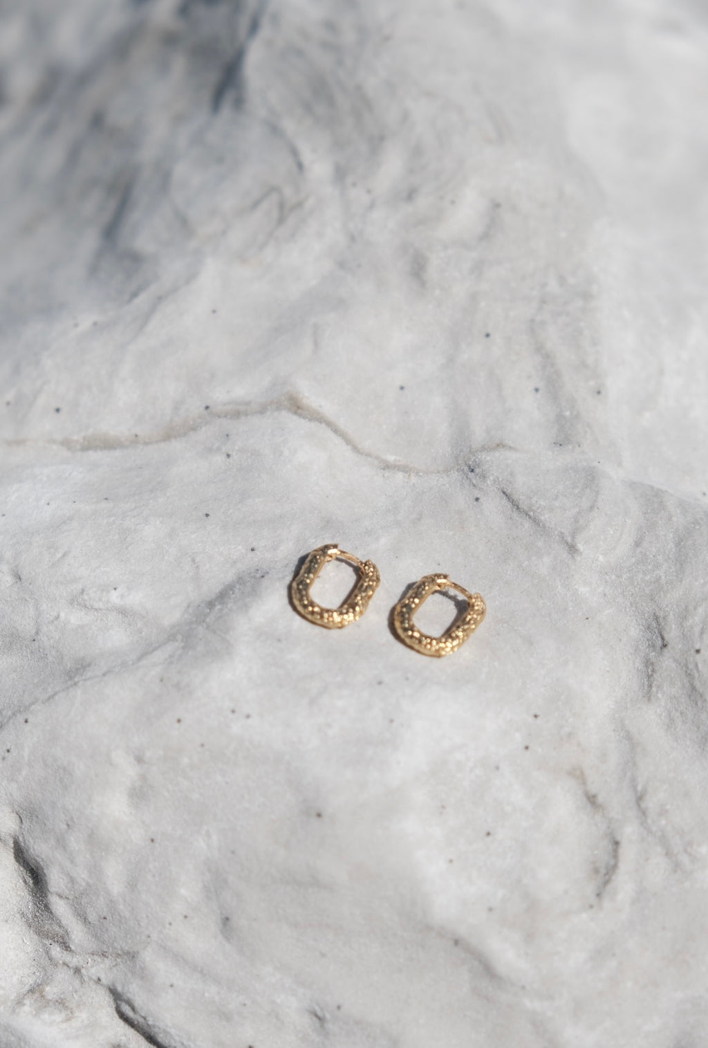 De Sol Huggie Earrings